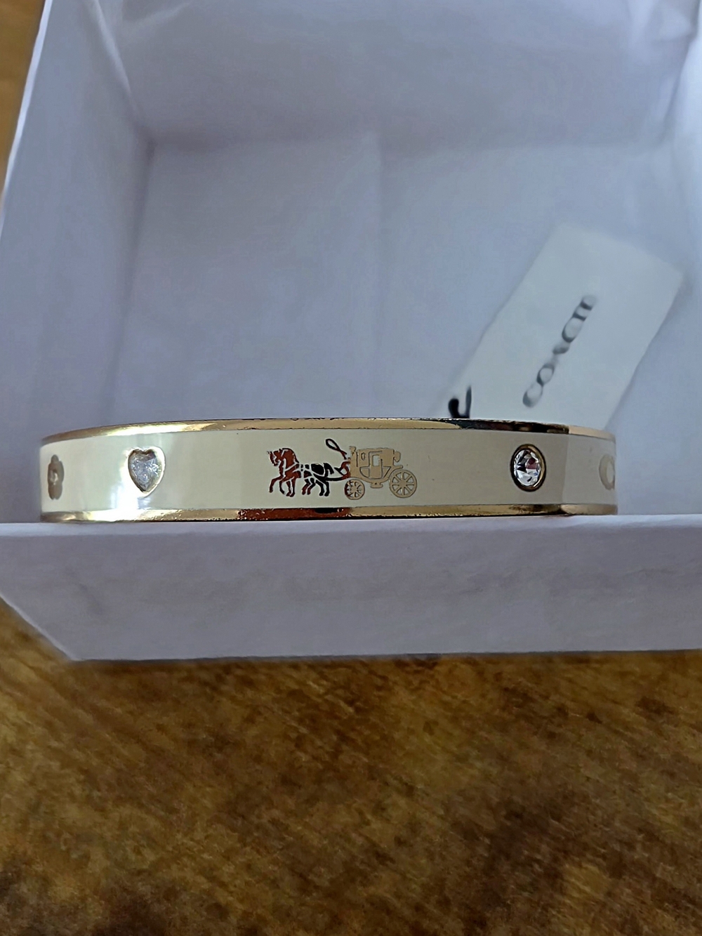 COACH Womens Signature Horse & Carriage Bangle Bracelet